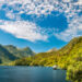 Deep Cove with the Shipping Docks and the Mountain Tops in the fjord at Doubtful Sound in New Zealand