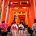 People visiting Fushimi Inari Shrine in Kyoto also called Senbon Torii, one of the most visited in Kyoto